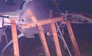 The steel being held in place while the silicone dries