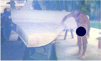 Sanding in Florida - at least it saves on the washing