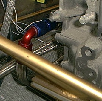 the oil feed is at the bottom of the engine