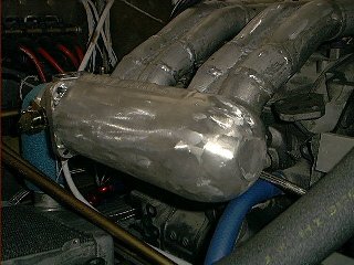The aft end has a dome to clear the cowl and help the pulses bounce - Ed says that's good. <IMG SRC = 