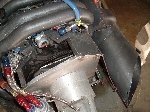 Redrive. Remote oil filter, and yes - the fuel rails and injectors are UNDER the intake. Why? Because there wasnt clearance on top.
